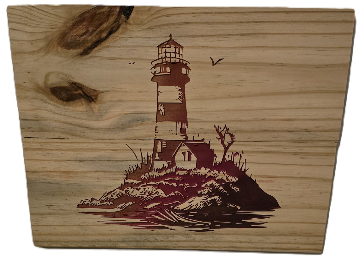 Lighthouse design engraved on wood, featuring a rocky island and detailed structure with trees and water.
