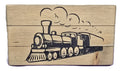 Wooden block featuring a black and white illustration of a vintage steam train with smoke clouds.