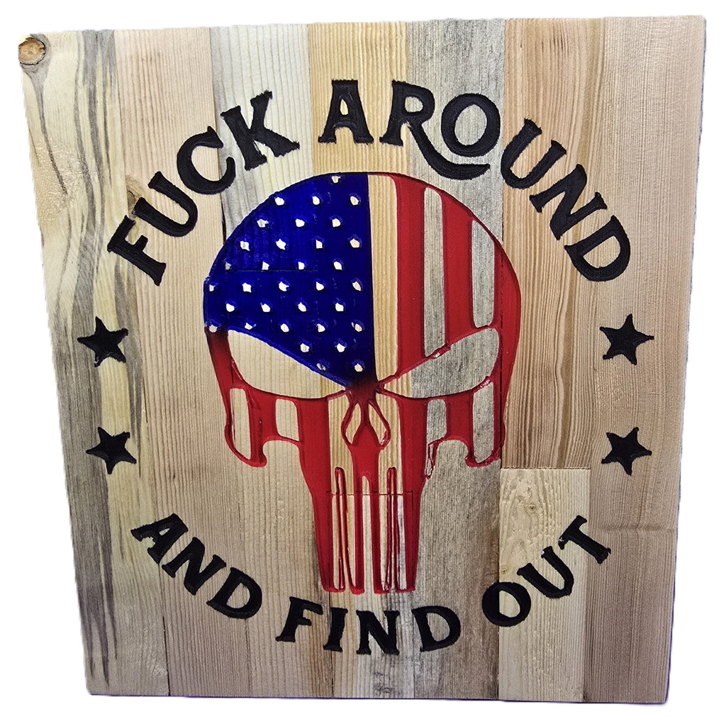 Wooden wall art featuring a skull design with an American flag, inscribed with "Fuck around and find out.