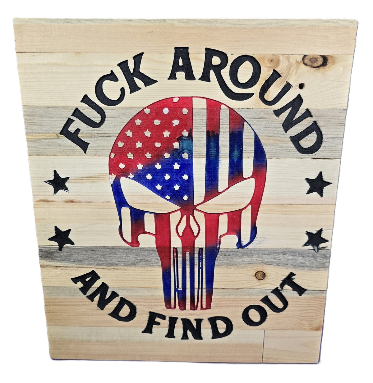 Wooden sign featuring a skull design with an American flag pattern and the text "Fuck around and find out.