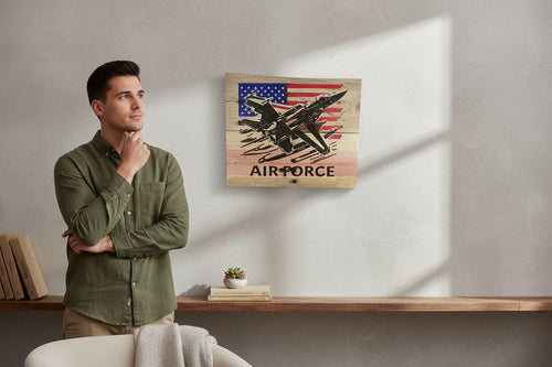 TK Wood Designs wooden sign featuring a black silhouette of an F-18 fighter jet flying over a distressed American flag with "AIR FORCE" text below.