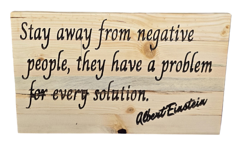 TK Wood Designs natural wood wall art with Albert Einstein quote: "Stay away from negative people, they have a problem for every solution."
