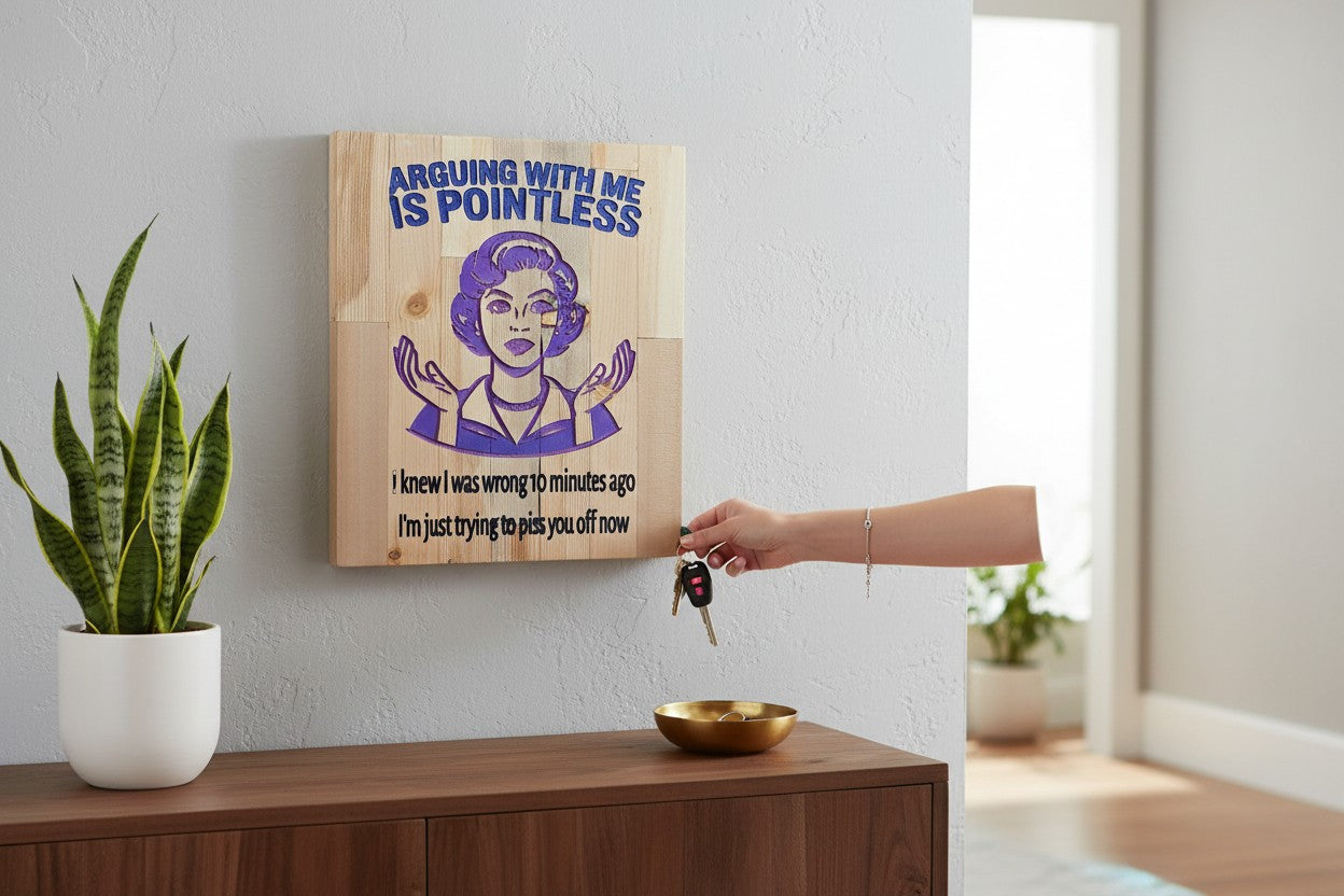TK Wood Designs wooden sign with purple carved illustration of a woman and text: Arguing with me is pointless. I knew I was wrong 10 minutes ago, I'm just trying to piss you off now.