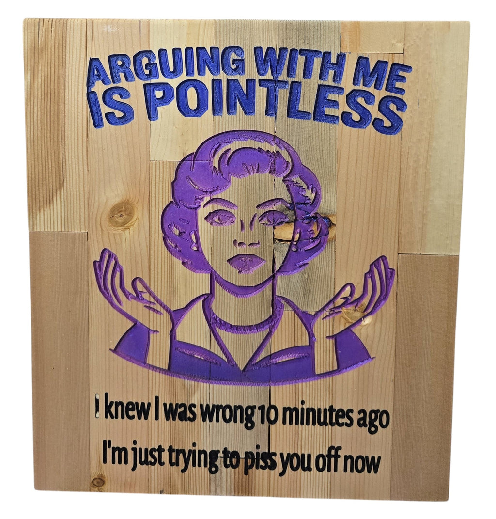 TK Wood Designs wooden sign with purple carved woman and text: Arguing with me is pointless. I knew I was wrong 10 minutes ago, I'm just trying to piss you off now.