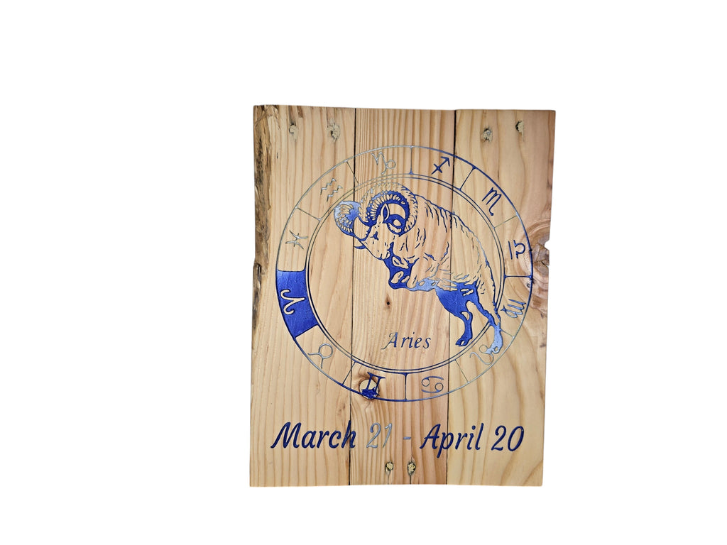 TK Wood Designs Aries zodiac wall art plaque featuring a blue engraved ram illustration on natural rustic wood grain.