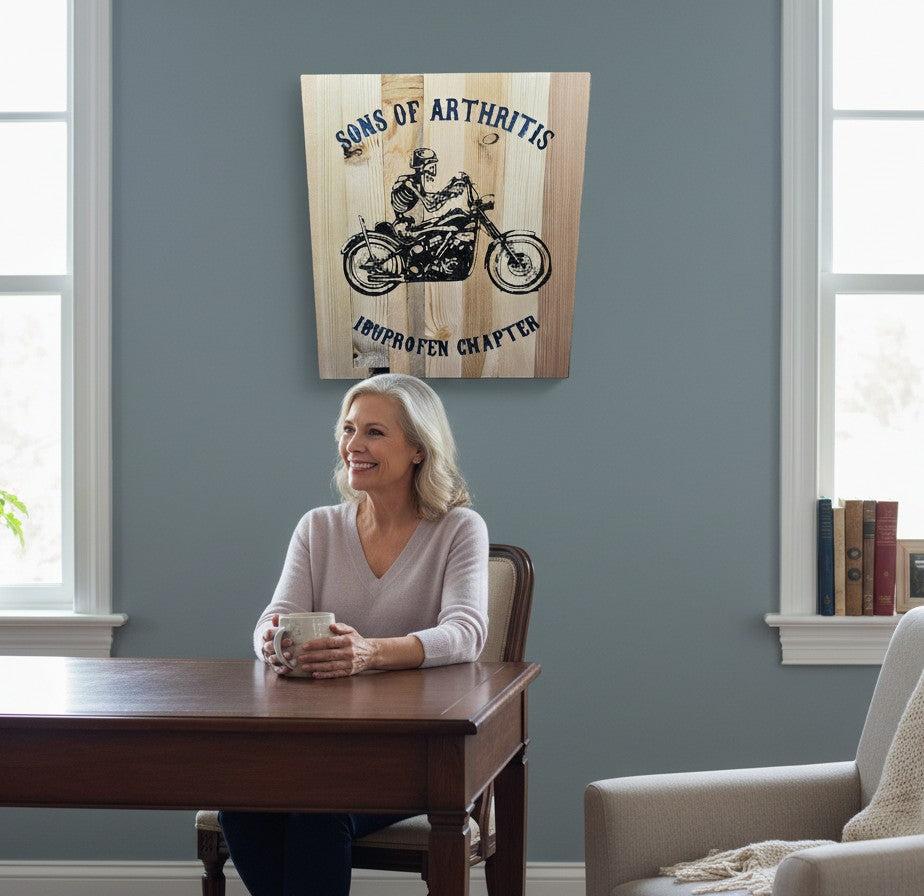TK Wood Designs rustic wooden sign with a skeleton riding a motorcycle, reading "Sons of Arthritis Ibuprofen Chapter".