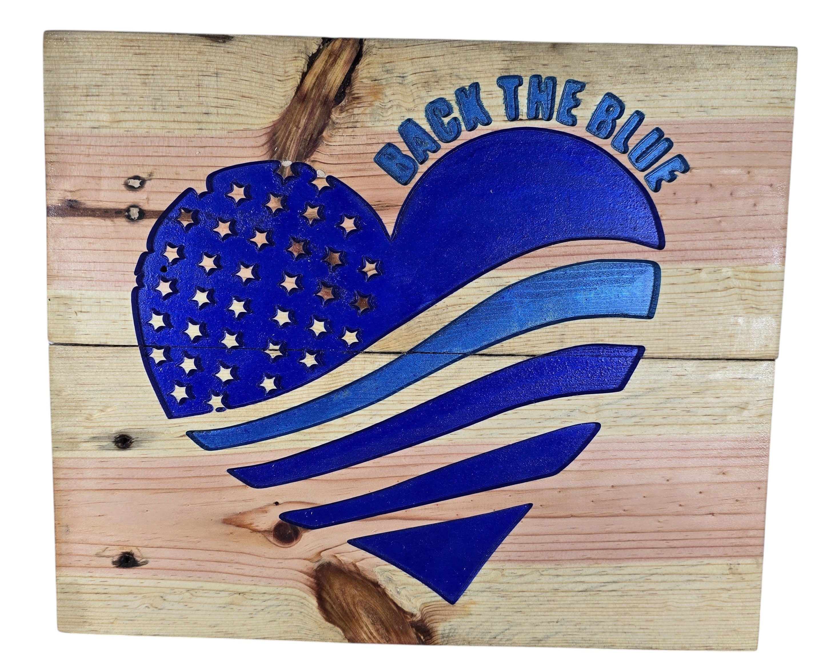 TK Wood Designs natural wood wall art featuring a blue heart with carved stars and stripes, and "BACK THE BLUE" lettering.