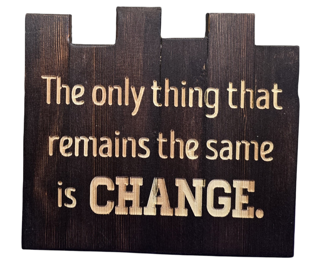 TK Wood Designs handmade dark wood sign with carved text: "The only thing that remains the same is CHANGE."