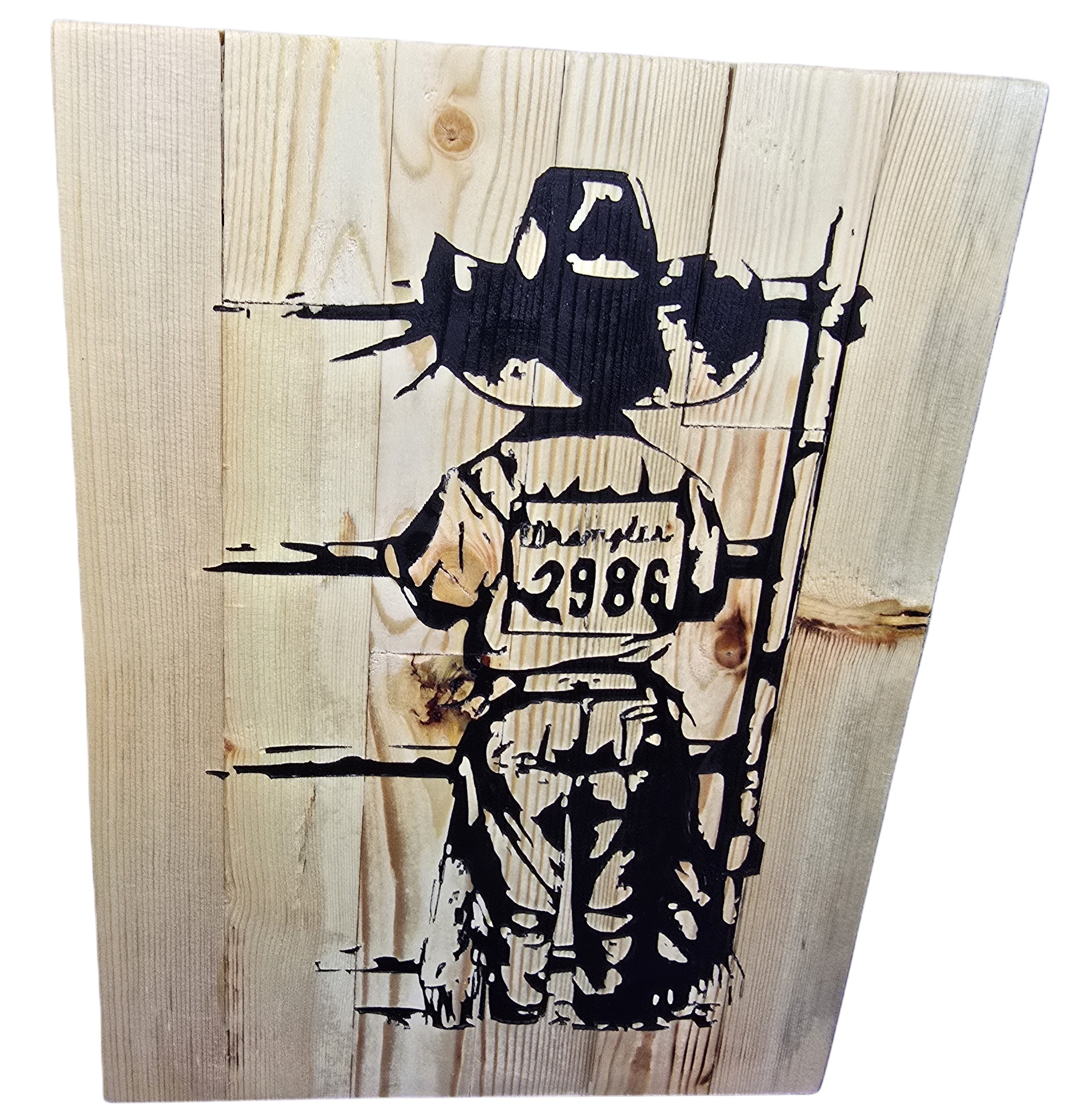 TK Wood Designs child cowboy wooden sign with black stencil art of a child in cowboy hat and western wear, 13" H x 10" W.