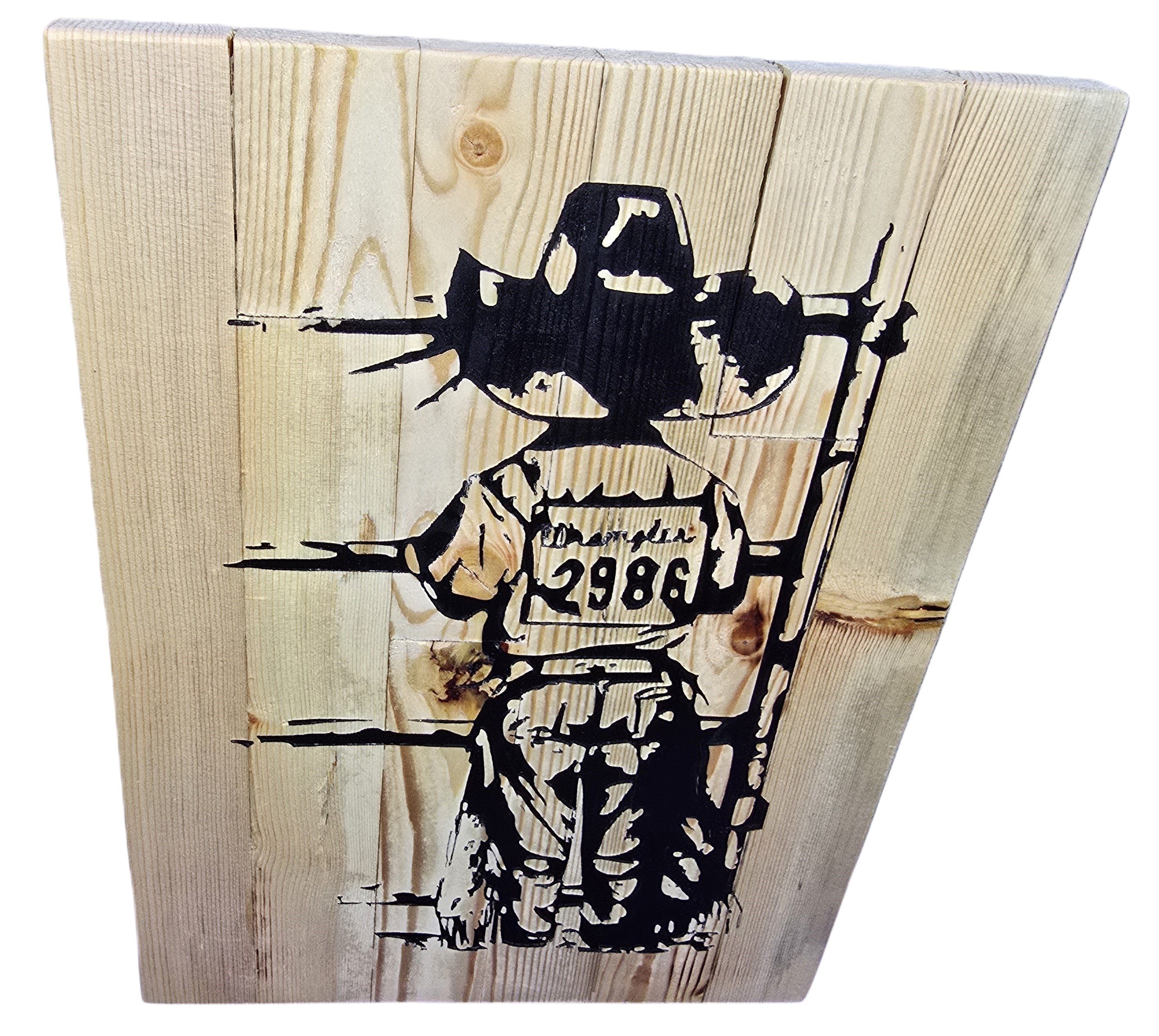 TK Wood Designs child cowboy wooden sign with black graphic of a child in a cowboy hat and western wear, 13" H x 10" L.