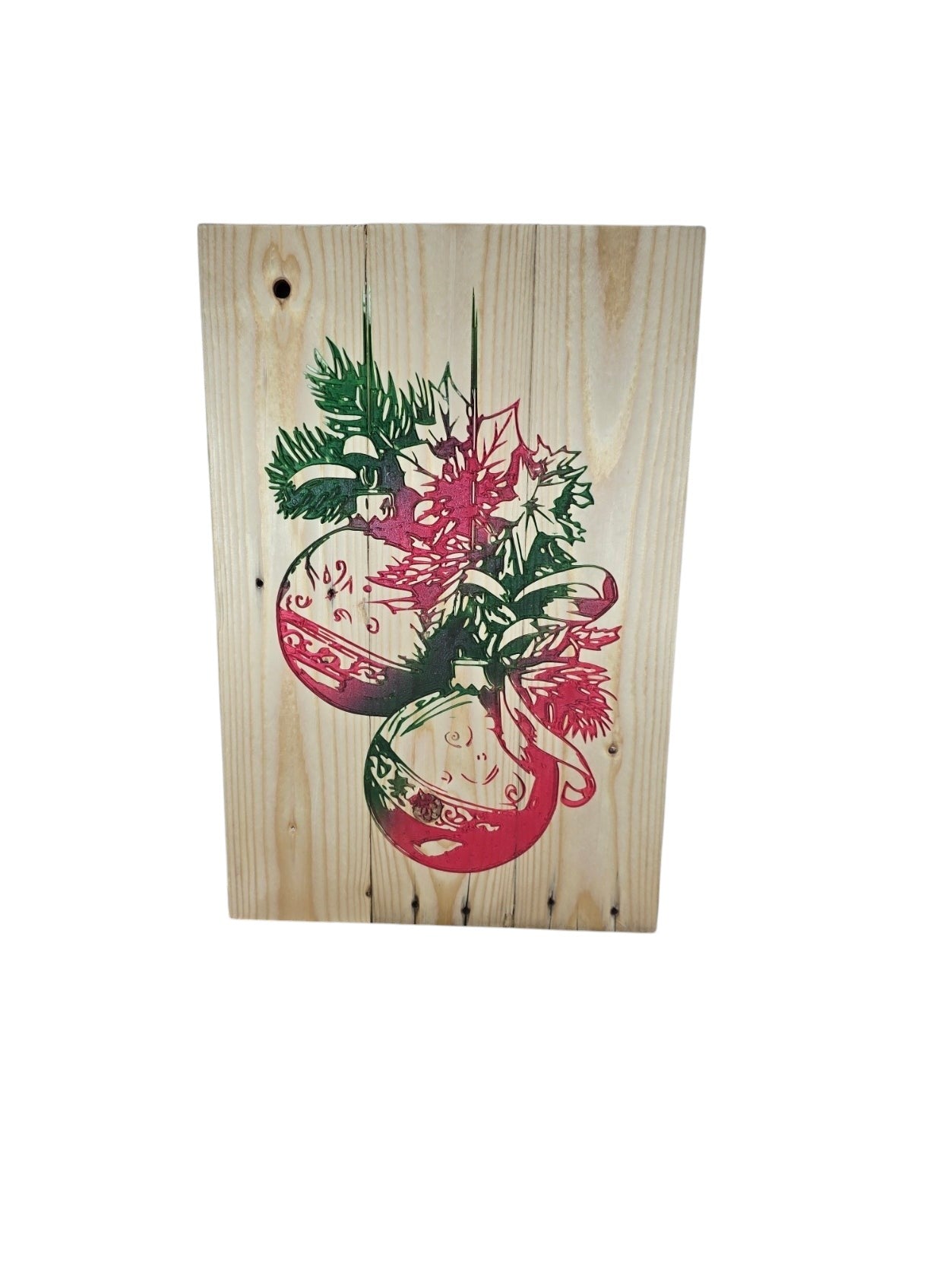 TK Wood Designs rustic wood wall plaque featuring a vibrant red and green Christmas ornament and poinsettia illustration.