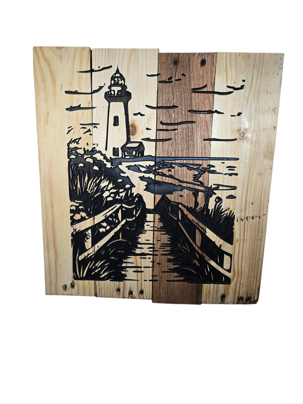 TK Wood Designs coastal lighthouse wooden wall art with a boardwalk and ocean scene etched on natural wood planks.