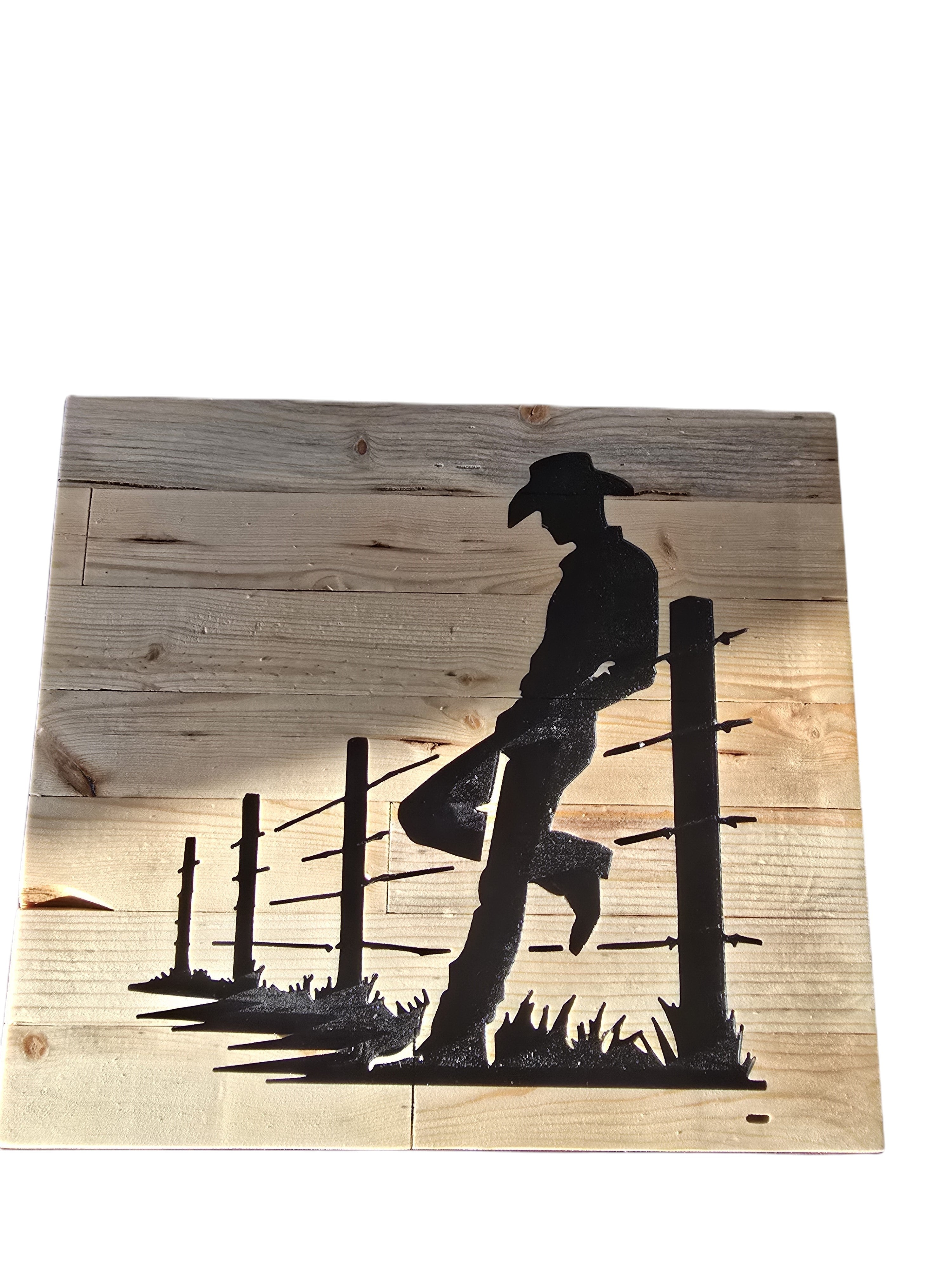 TK Wood Designs rustic wooden sign featuring a black silhouette of a cowboy leaning on a fence, with distressed wood planks.