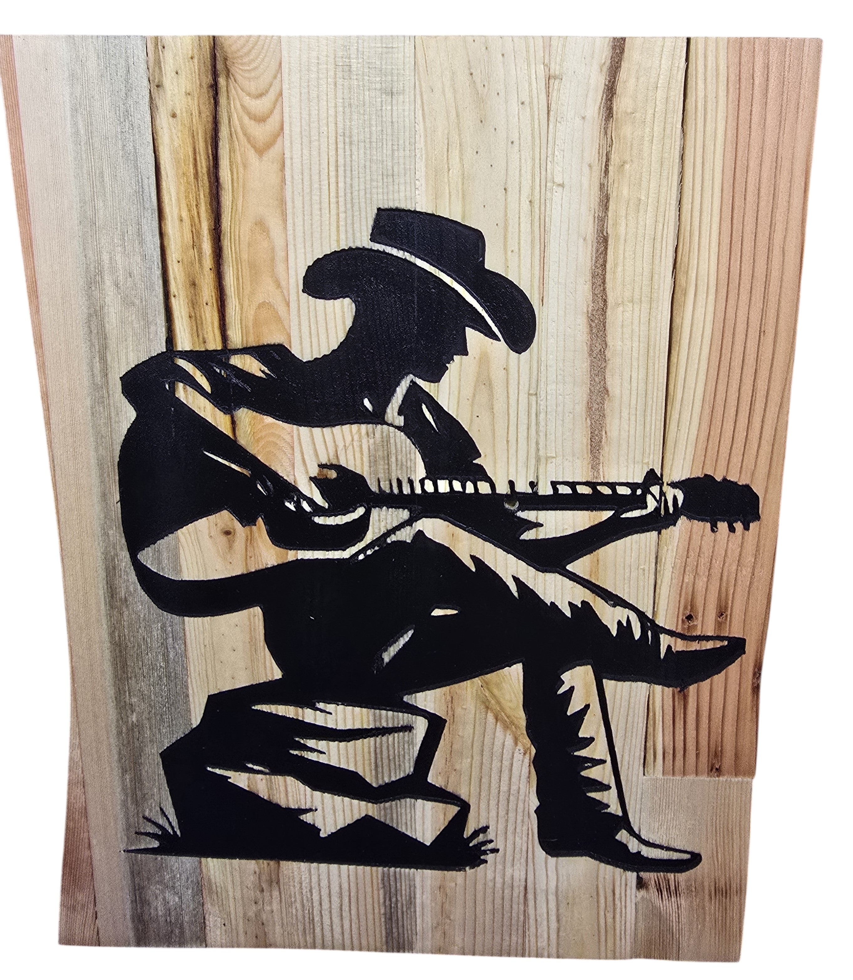 TK Wood Designs rustic reclaimed wood sign featuring a black silhouette of a cowboy playing guitar. Natural wood grain and weathered patina.