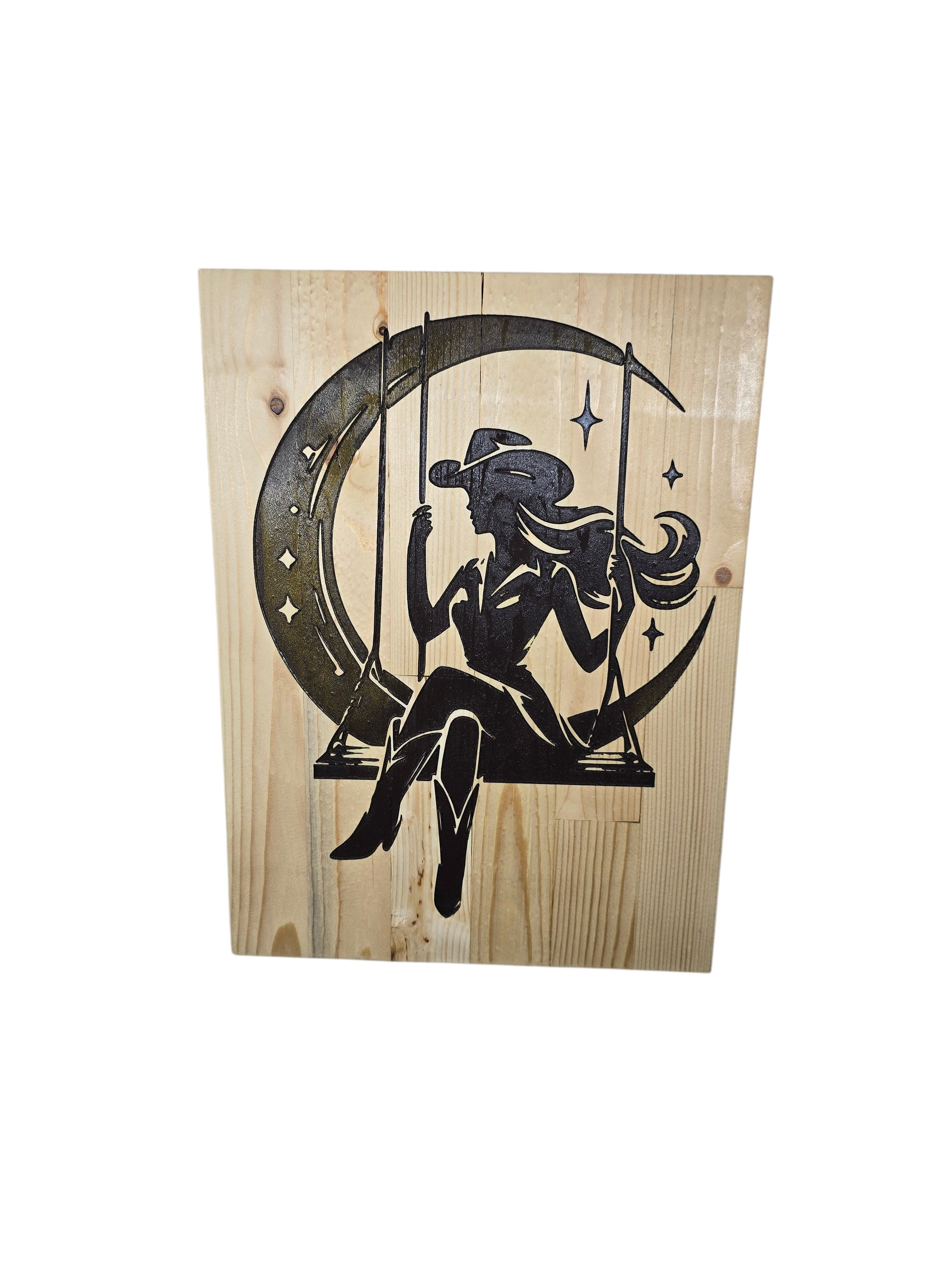 TK Wood Designs rustic wood sign featuring a cowgirl silhouette on a swing against a crescent moon and stars.