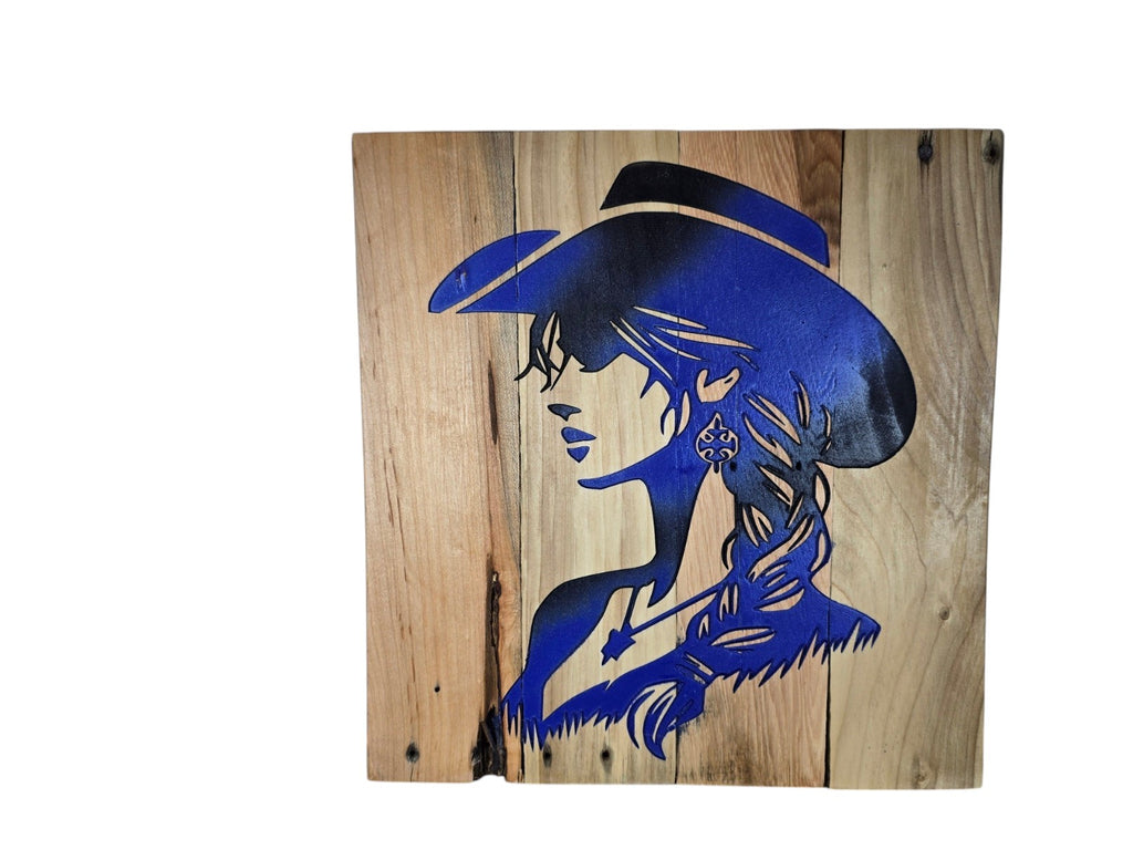 TK Wood Designs rustic wall art featuring a deep blue cowgirl silhouette painted on a reclaimed wood panel.
