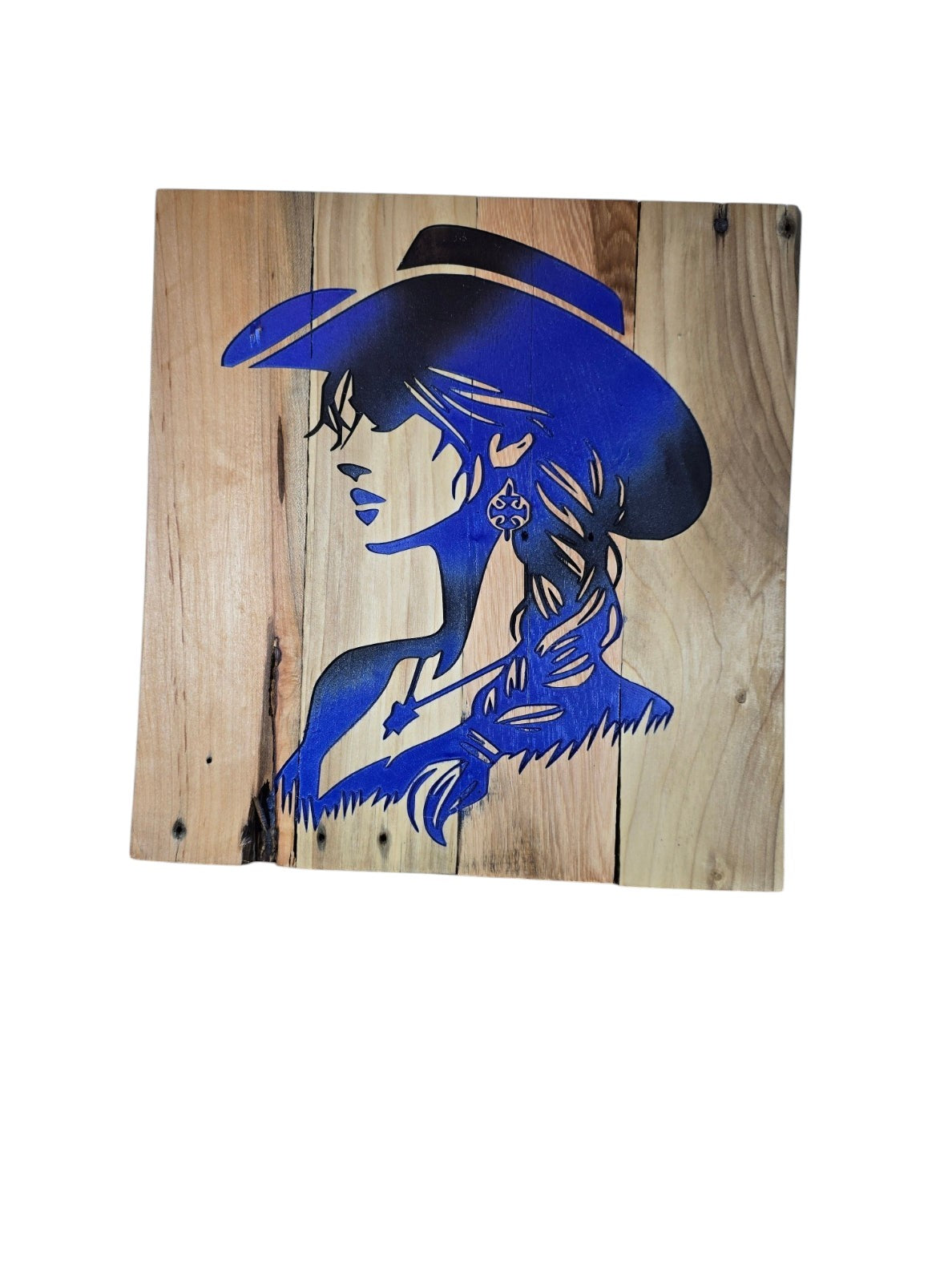 TK Wood Designs rustic wall art featuring a blue cowgirl silhouette painted on a reclaimed wood panel.