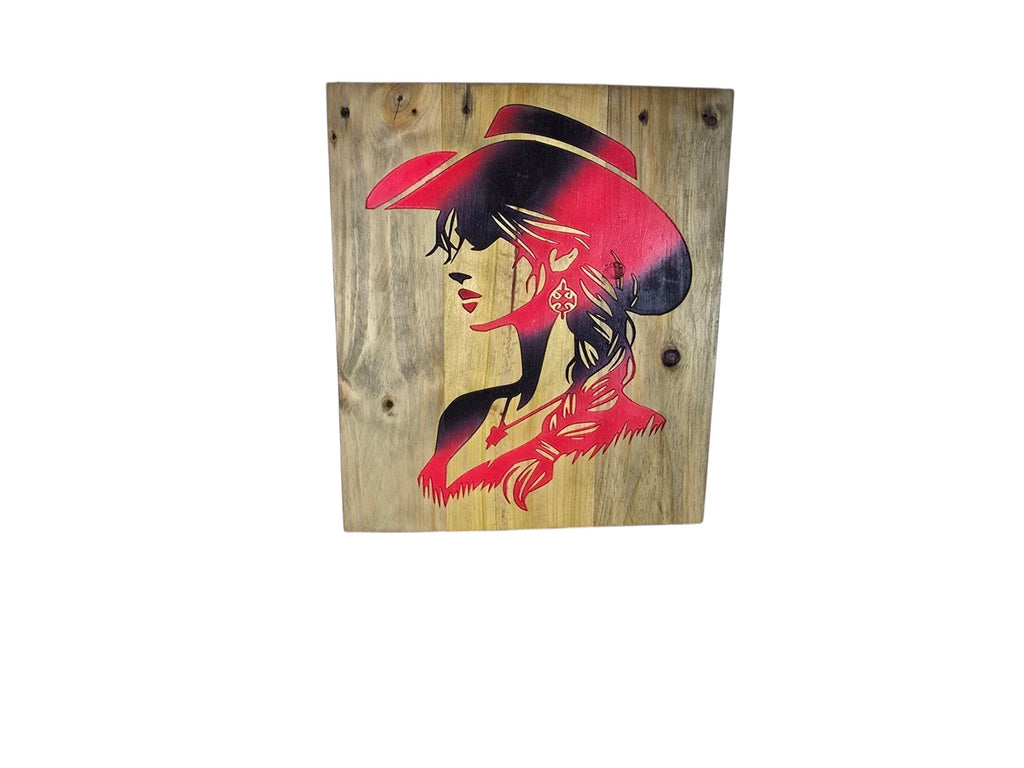 TK Wood Designs rustic wooden sign featuring a vibrant red and black silhouette of a cowgirl wearing a cowboy hat.