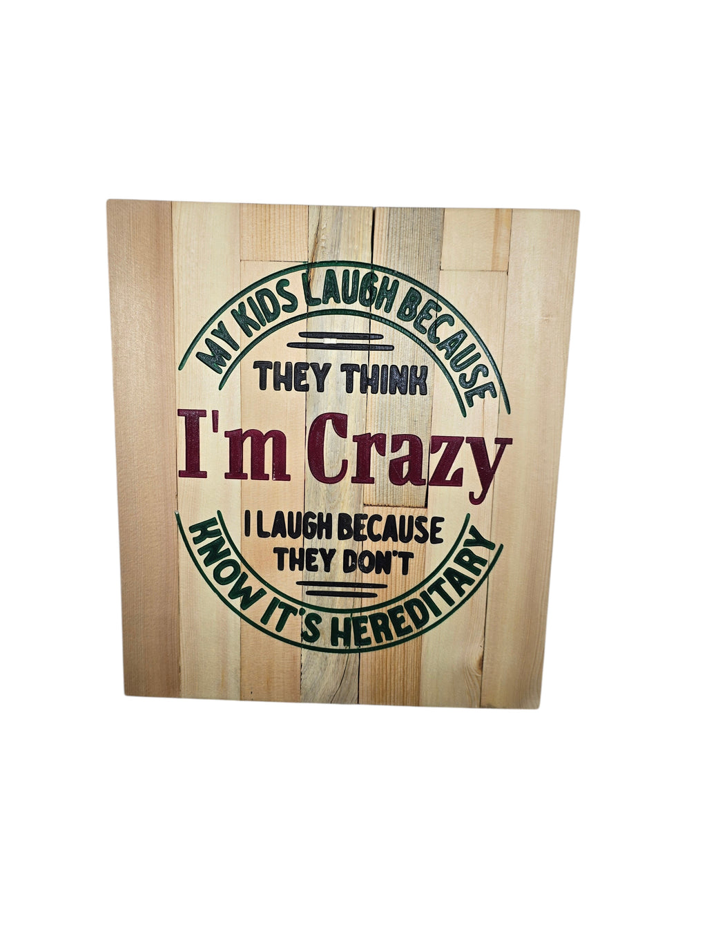 TK Wood Designs wooden sign with "My kids laugh because they think I'm crazy. I laugh because they don't know it's hereditary" quote.