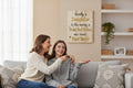 TK Wood Designs natural wood sign with quote "Having a Daughter Is like having a Broke Best Friend who thinks Your Rich!" in black and gold lettering.