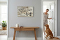 TK Wood Designs wooden sign with "Dogs Welcome, People Tolerated" and two dog portraits.