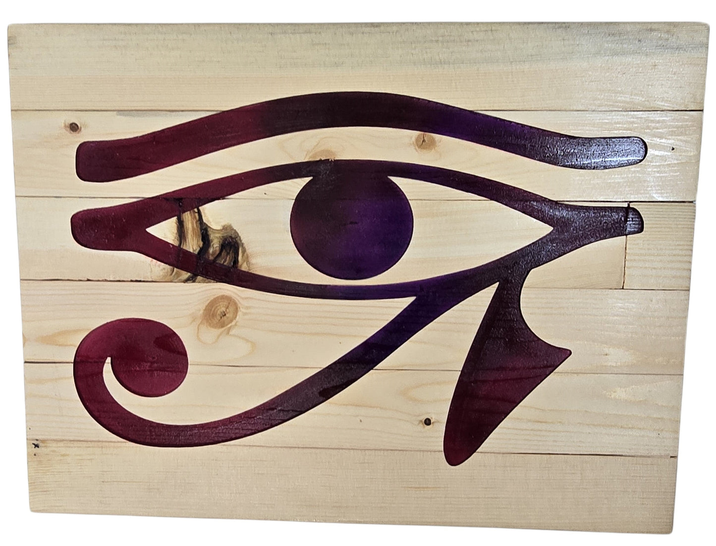 TK Wood Designs natural wood wall art featuring a deep purple Eye of Horus symbol. Rustic and symbolic.