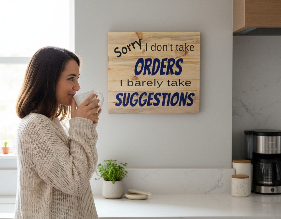 TK Wood Designs natural wood sign with black and blue text reading "Sorry I don't take ORDERS I barely take SUGGESTIONS".
