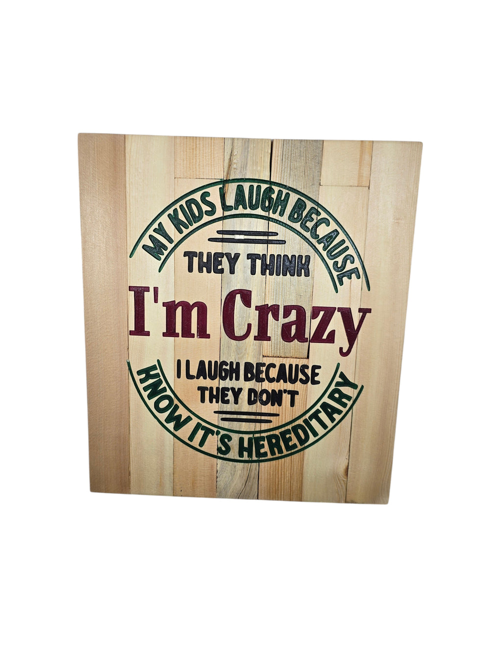 TK Wood Designs rustic wooden sign with humorous quote 'My kids laugh because they think I'm crazy, I laugh because they don't know it's hereditary.'