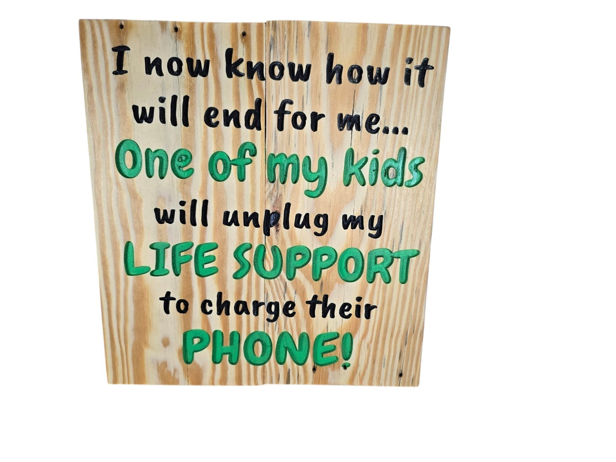 TK Wood Designs handmade wooden sign with humorous quote about kids and phone charging in black and green lettering.