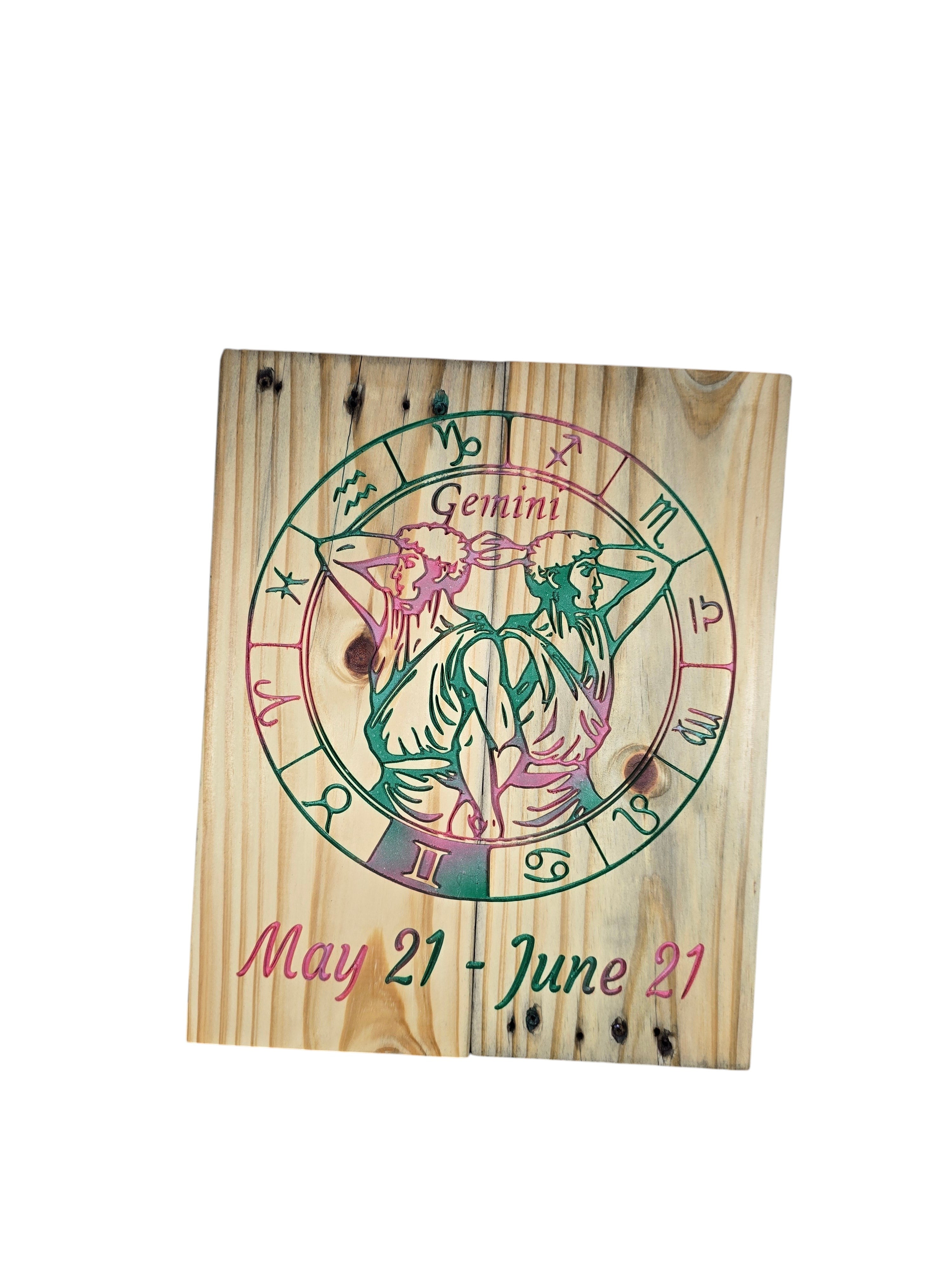 TK Wood Designs Gemini zodiac sign wall art featuring colorful engraved twins and a zodiac wheel on natural wood.