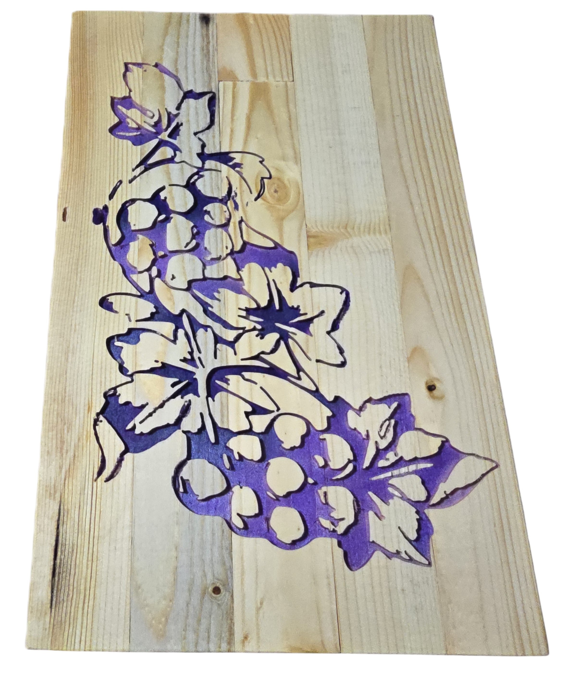 TK Wood Designs handcrafted wooden sign with carved purple grapes and leaves on a light wood plank background.