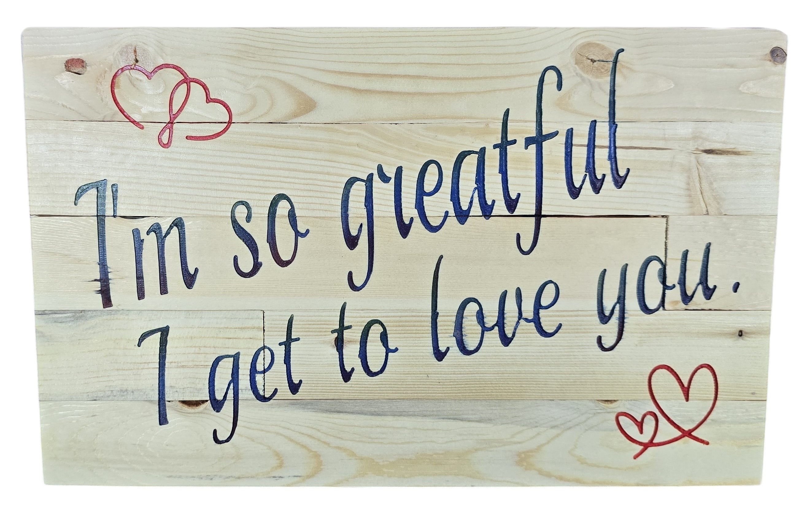 TK Wood Designs natural wood sign with navy blue script saying "I'm so grateful I get to love you." accented with red hearts.