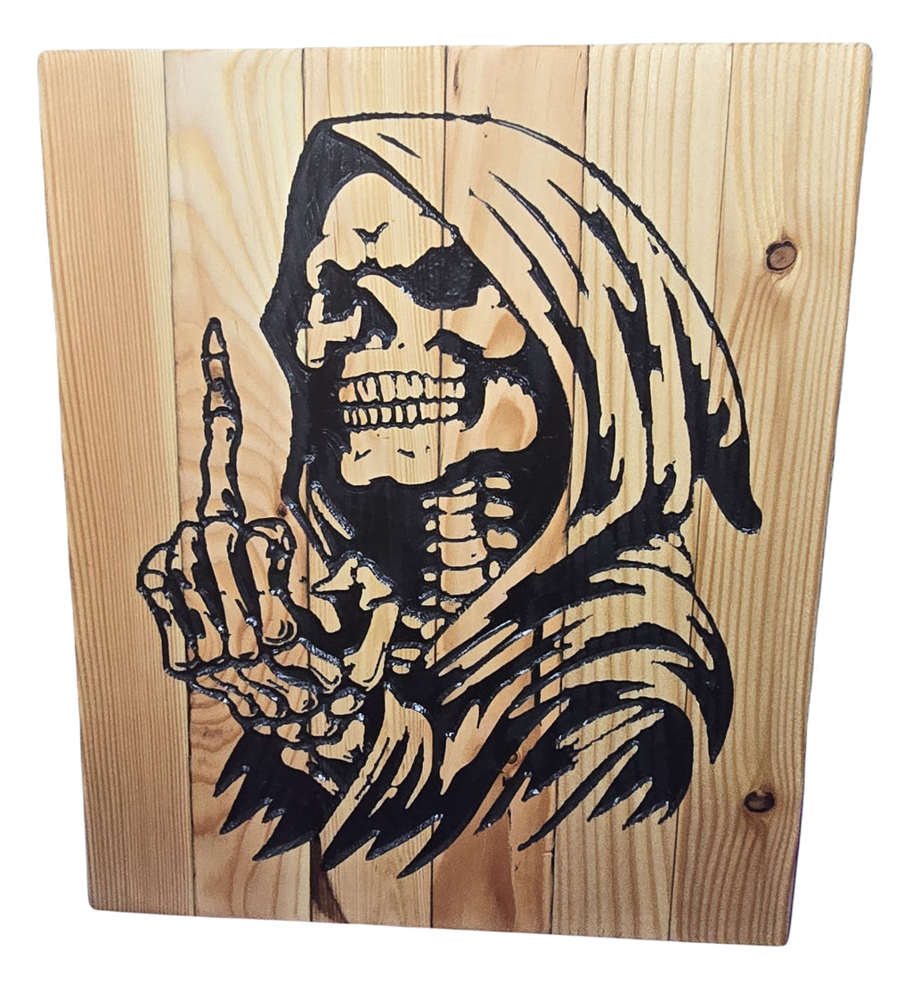 TK Wood Designs Grim Reaper wood wall art with black graphic on natural wood, giving a number one gesture.