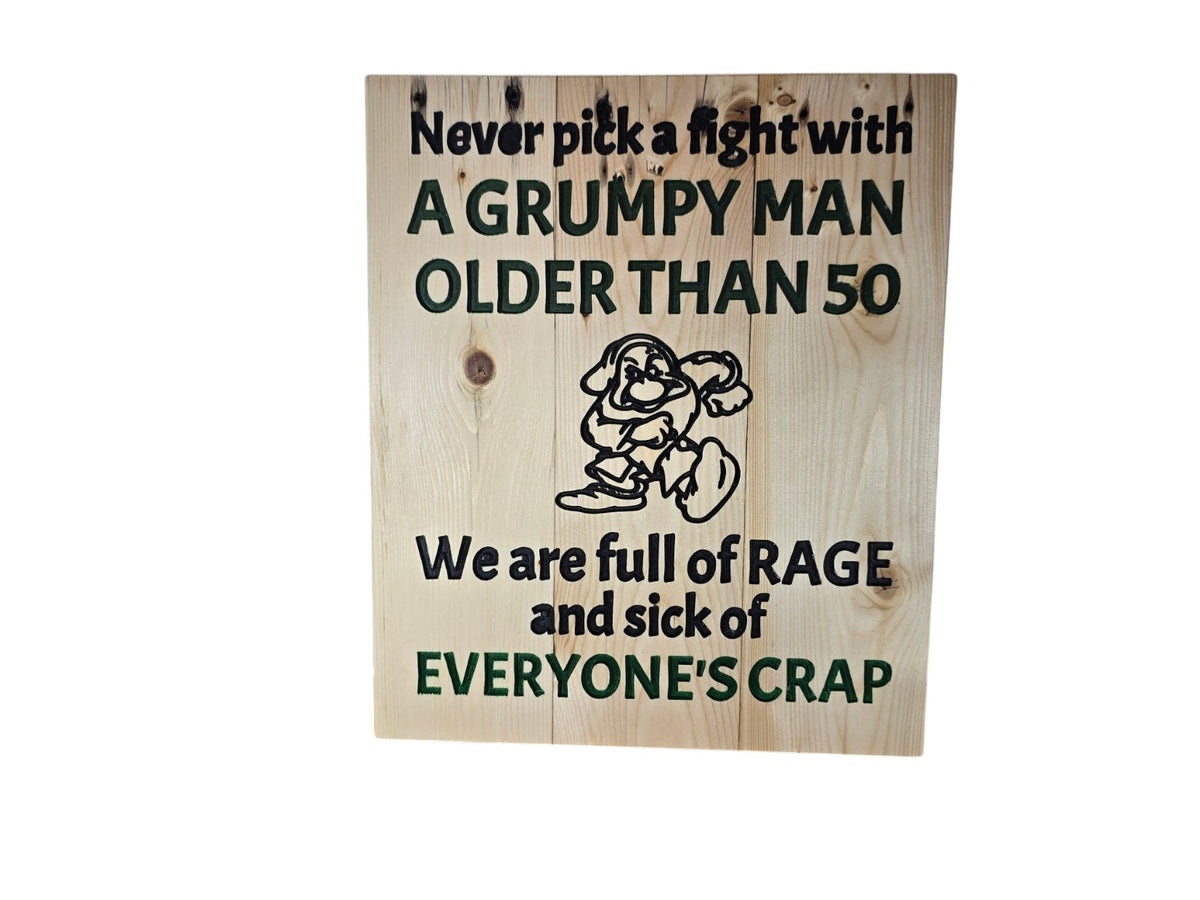 TK Wood Designs humorous wooden wall sign featuring a grumpy character illustration and funny text for men over 50.