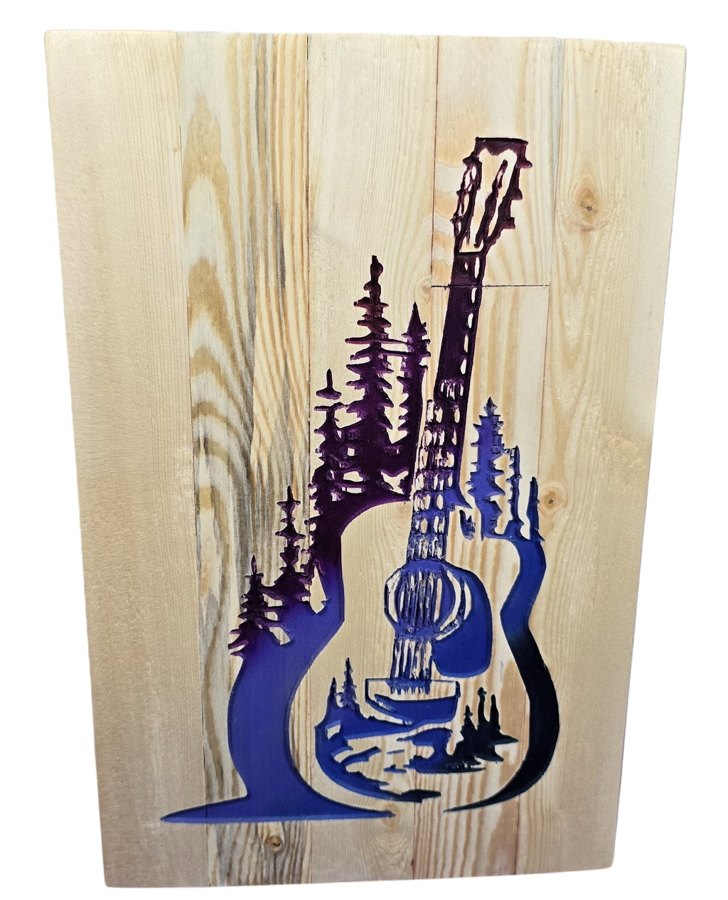 TK Wood Designs handcrafted wooden guitar sign with carved trees and purple accents. Natural wood grain.