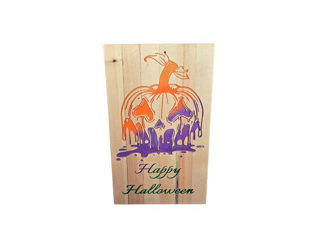 TK Wood Designs Melting pumpkin Halloween sign, hand-painted on reclaimed wood with orange and purple drips.