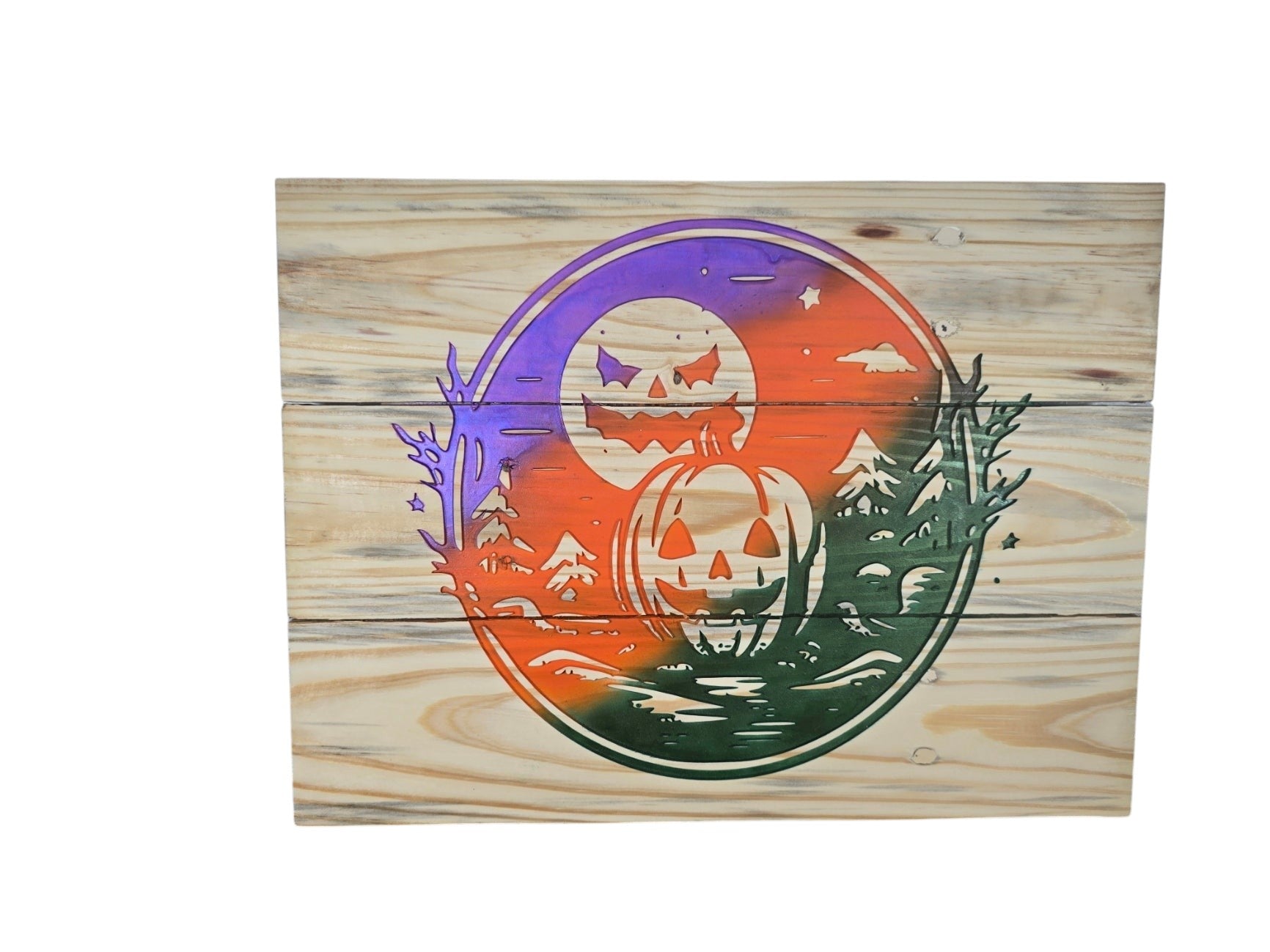 TK Wood Designs rustic plank wall sign featuring a laser-cut pumpkin and moon motif with purple, orange, and green hues.