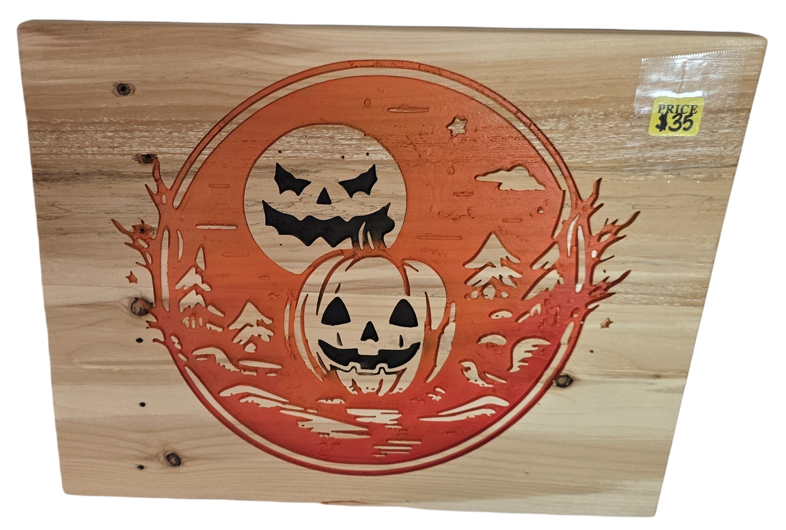 TK Wood Designs orange carved wood Halloween art with jack-o'-lanterns, moon, and trees.