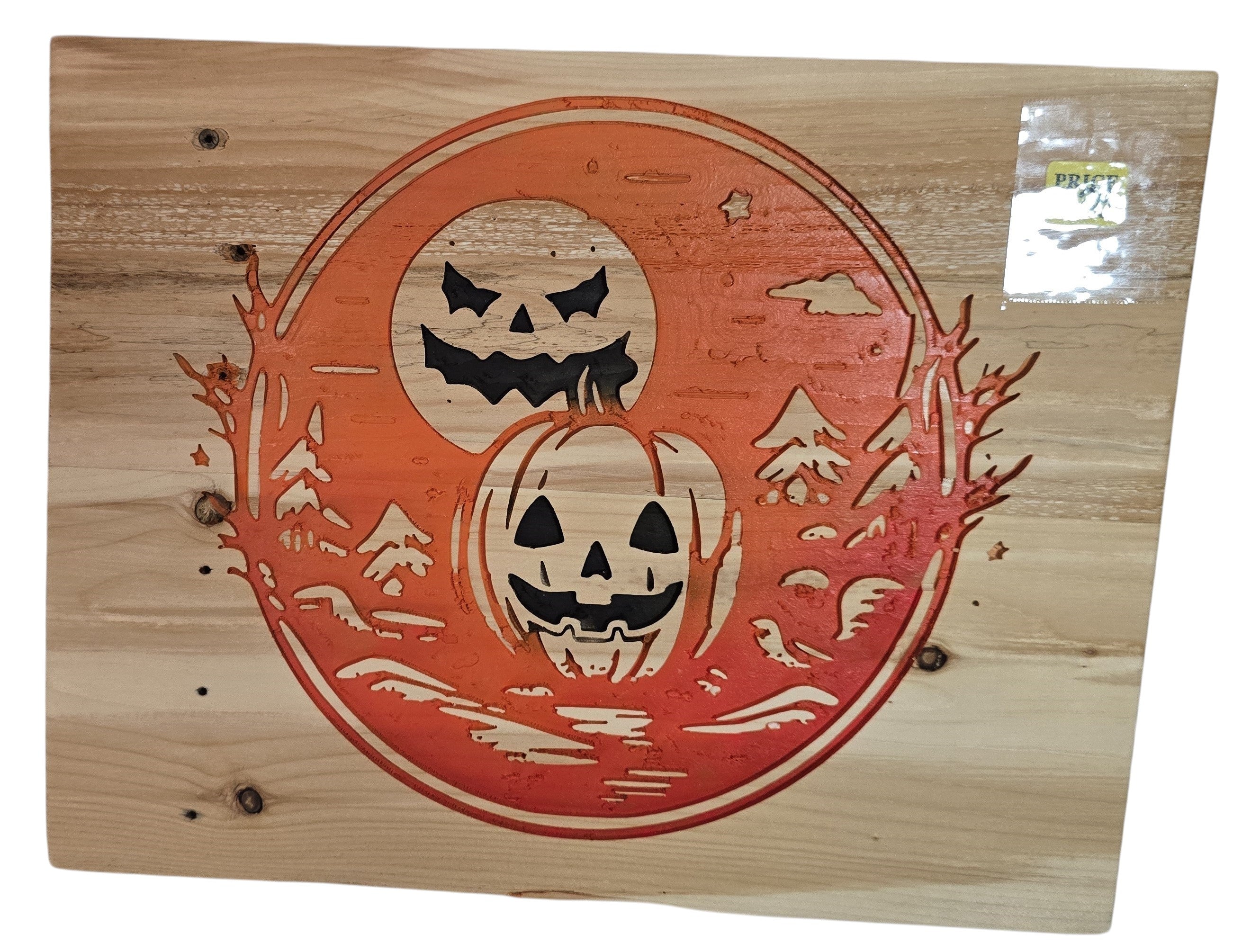 TK Wood Designs Halloween wood wall art with carved jack-o'-lanterns, moon, and trees in orange.