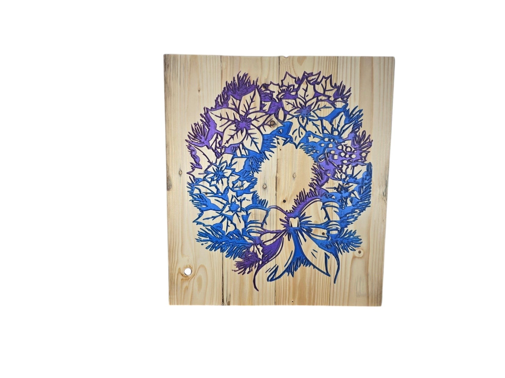 TK Wood Designs holiday wreath wall art featuring a blue and purple gradient floral design on natural wood grain.