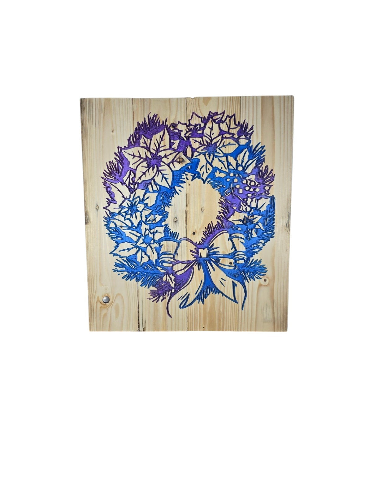 TK Wood Designs holiday wreath wall art on natural wood with a vibrant blue and purple gradient floral motif.