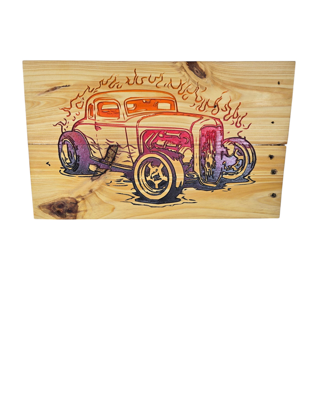 TK Wood Designs vintage hot rod wood art with flames, featuring a classic coupe in orange, pink, and purple hues on natural wood.