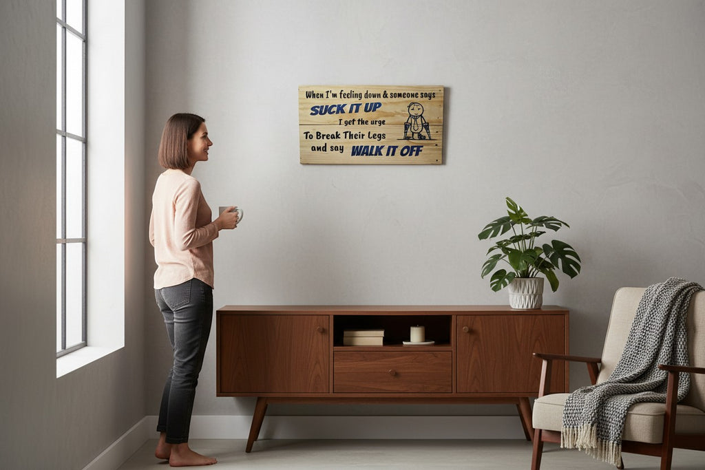 TK Wood Designs wooden sign with humorous quote about feeling down and a stick figure with crutches.
