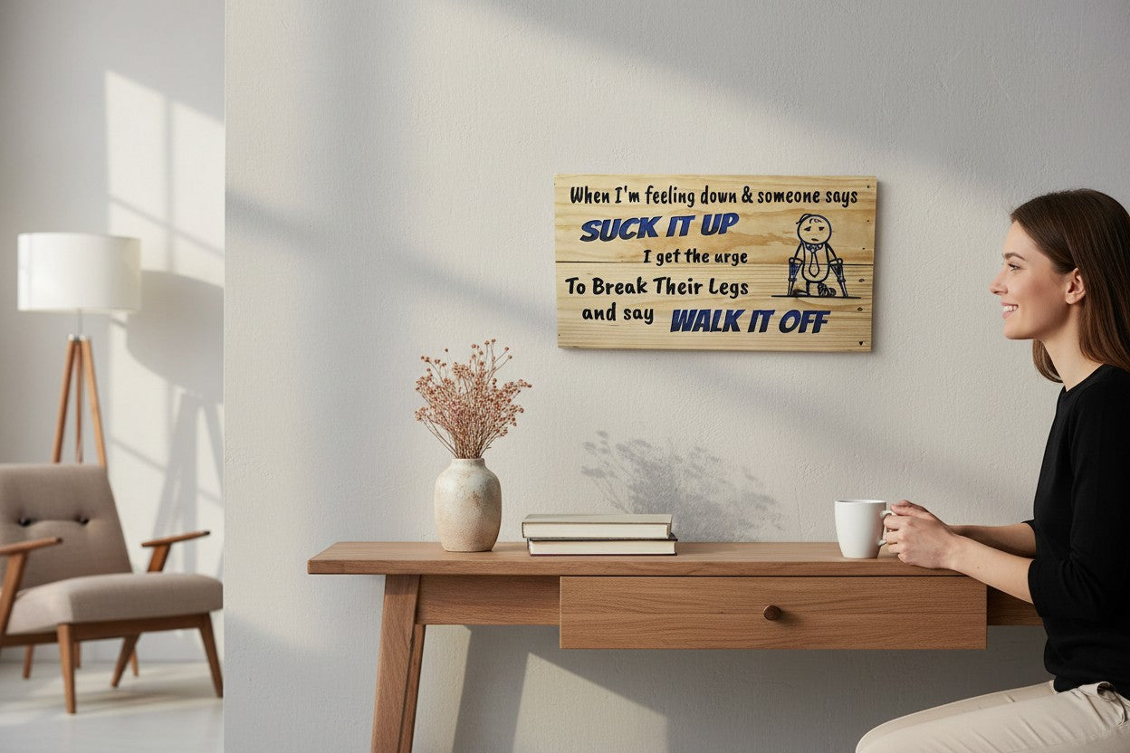 TK Wood Designs wooden sign with humorous quote about feeling down and a stick figure with crutches.