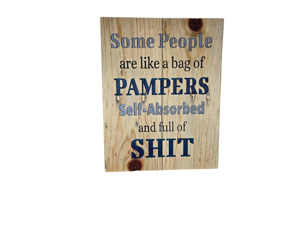 TK Wood Designs rustic wooden wall sign with humorous text about self-absorbed people in blue and black lettering.