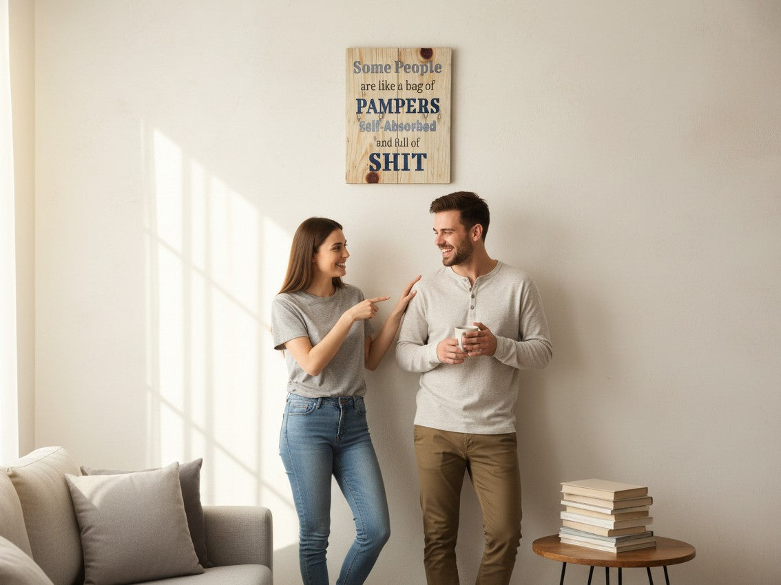 TK Wood Designs humorous wooden wall sign with witty text hanging in a bright living room with a smiling couple.