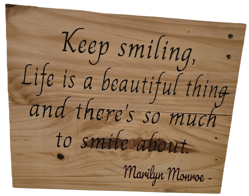 TK Wood Designs natural wood sign with carved quote 'Keep smiling, life is a beautiful thing and there's so much to smile about.' - Marilyn Monroe.