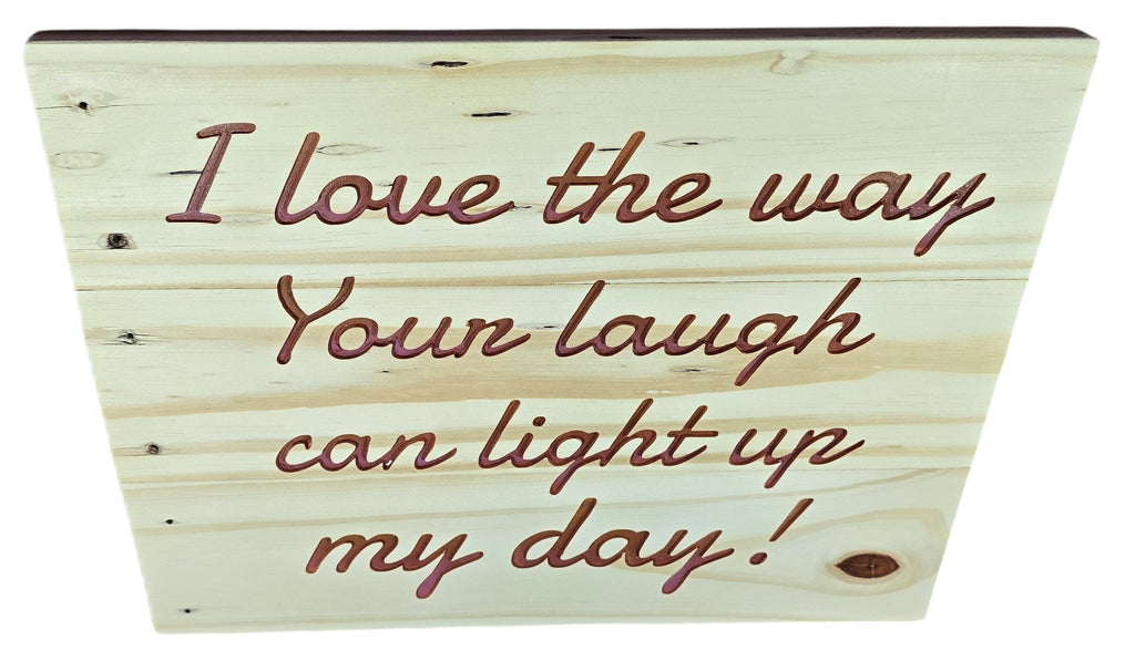 TK Wood Designs natural wood sign with embossed lettering reading "I love the way Your laugh can light up my day!"