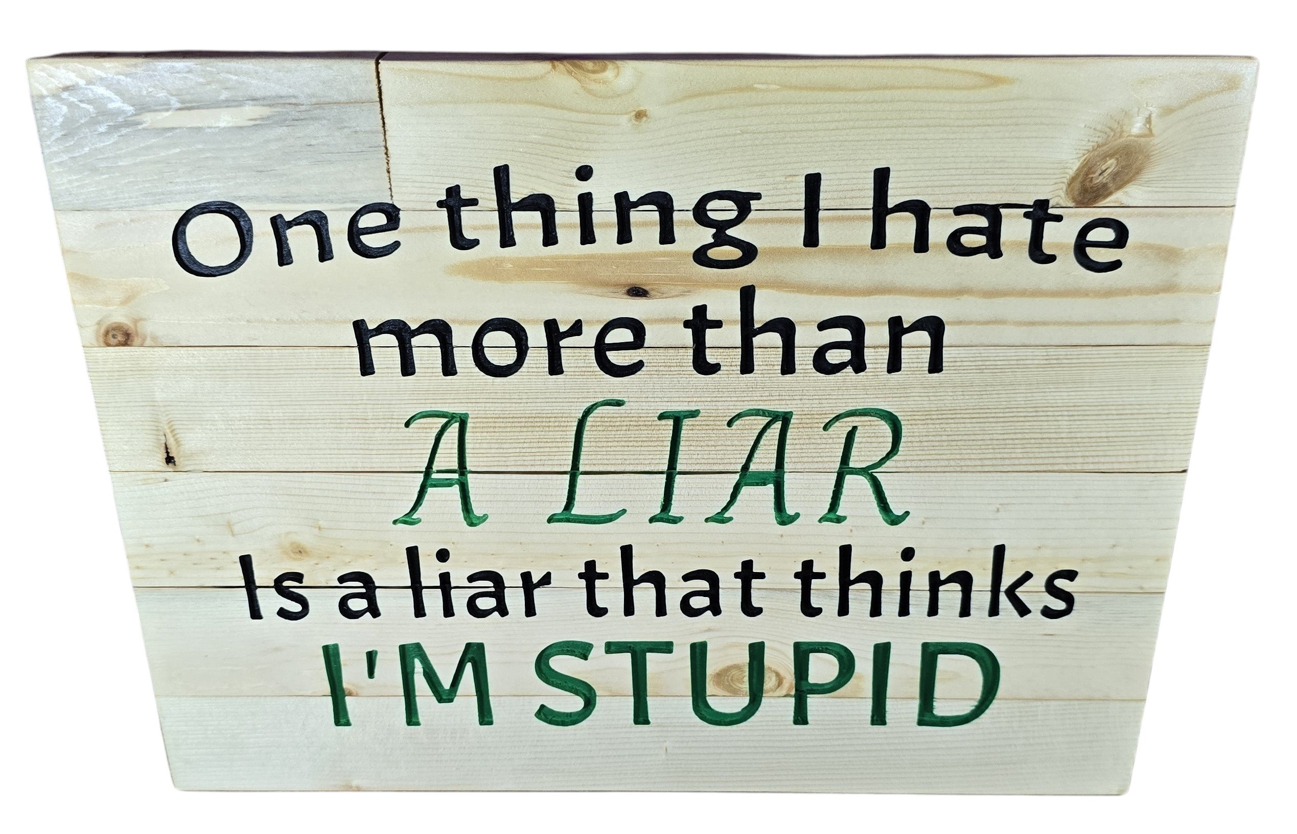 TK Wood Designs natural wood wall art with black and green text: "One thing I hate more than a liar is a liar that thinks I'm stupid."