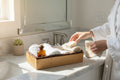 TK Wood Designs rustic live edge wooden tray holding white towels and bathroom essentials on a marble vanity